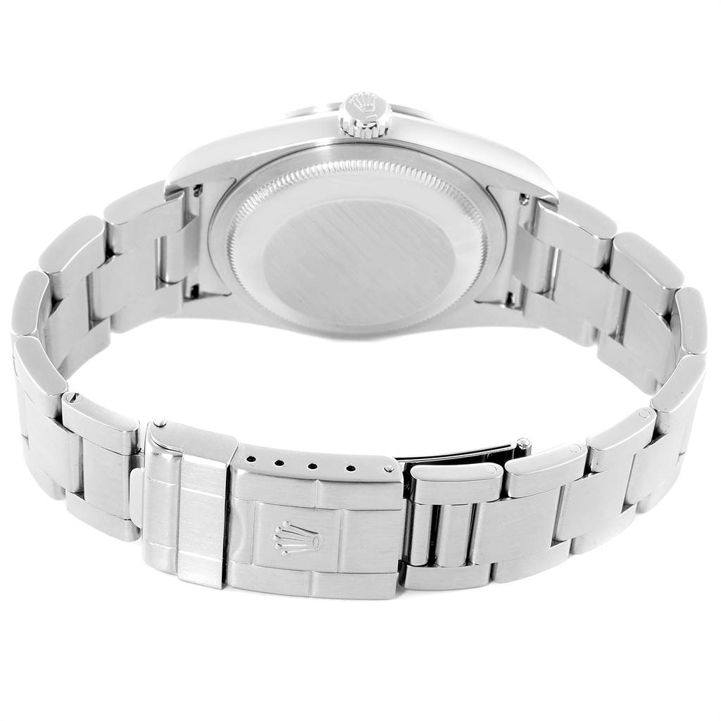 This image shows the backside and bracelet of a Rolex Explorer 114270 Men's Stainless Steel Black Dial 114270 Men's Stainless Steel Black Dial watch.