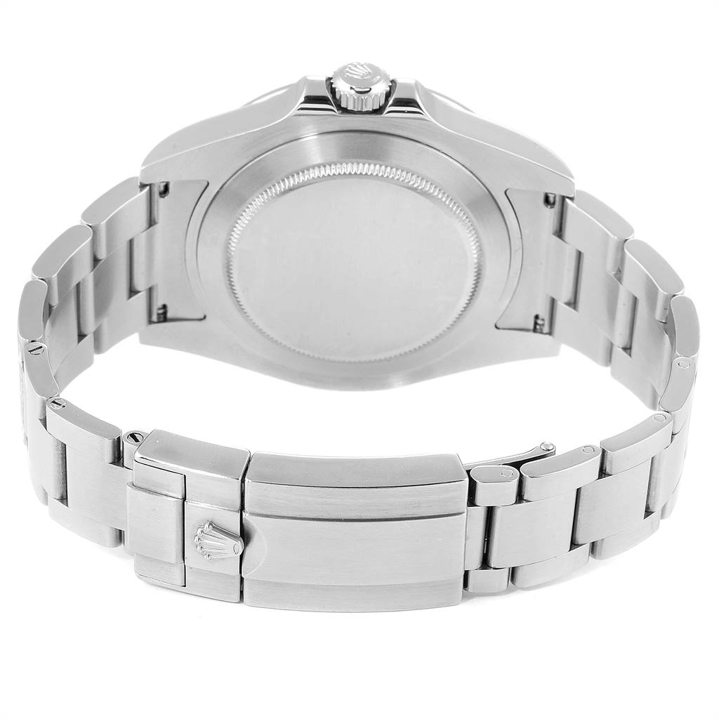 The image shows the back view of a Rolex Explorer 216570 Men's Stainless Steel Black Dial 216570 Men's Stainless Steel Black Dial watch, highlighting its clasp, bracelet, and case back.