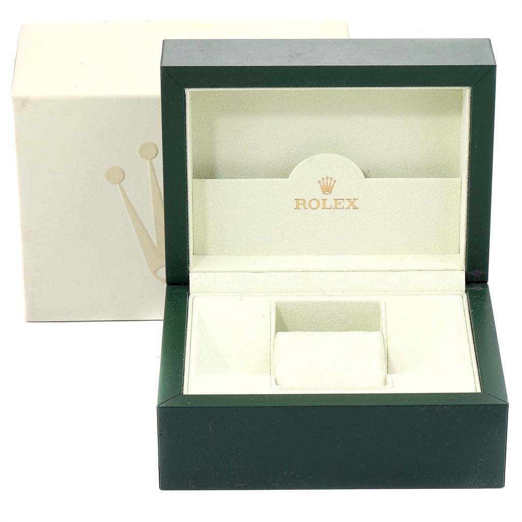 This image shows the open box for a Rolex Explorer 16570 Men's Stainless Steel White Dial 16570 Men's Stainless Steel White Dial watch from a front angle, displaying the inner cushioning and brand logo.