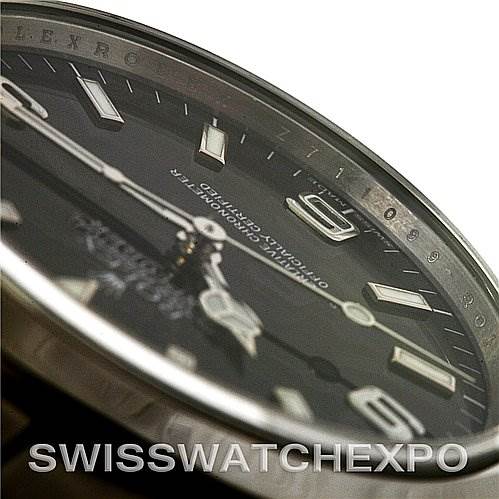 This image shows a close-up, angled view of the dial and bezel of a Rolex Explorer 114270 Men's Stainless Steel Black Dial 114270 Men's Stainless Steel Black Dial watch.