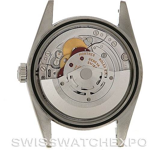 The image shows a rear view of the Rolex Explorer 114270 Men's Stainless Steel Black Dial 114270 Men's Stainless Steel Black Dial model, displaying its intricate internal mechanisms with the back cover removed.