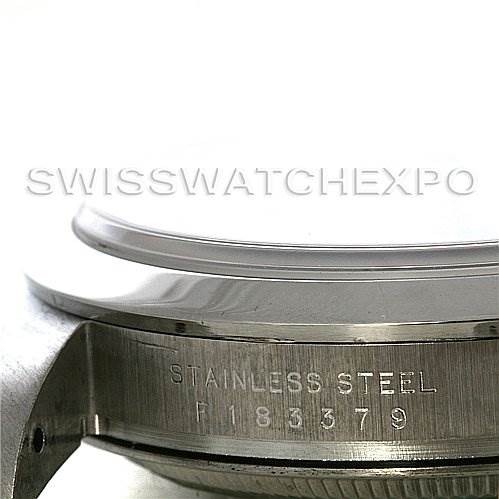 The image shows the side view of the bezel and case back of a Rolex Explorer 114270 Men's Stainless Steel Black Dial 114270 Men's Stainless Steel Black Dial watch, with "STAINLESS STEEL" and a serial number engraved.