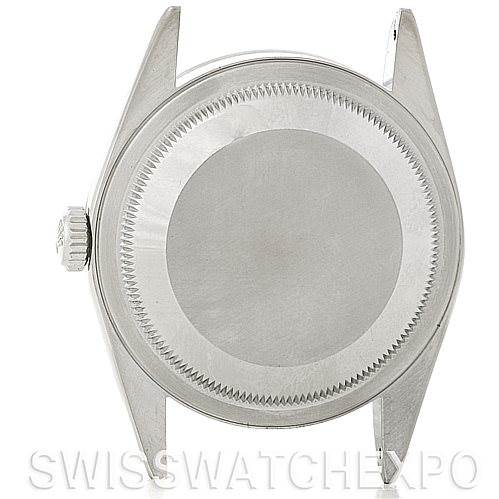 This image shows the back case and crown of a Rolex Explorer 14270 Men's Stainless Steel Black Dial 14270 Men's Stainless Steel Black Dial model watch from a top-down angle.