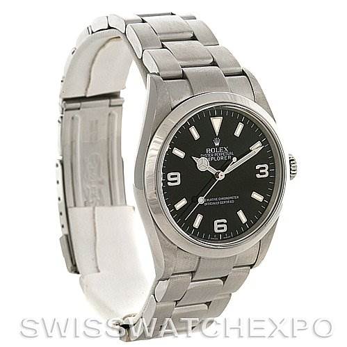 The Rolex Explorer 114270BKAO Men's Stainless Steel Black Dial 114270BKAO Men's Stainless Steel Black Dial watch is photographed at a slight angle, showcasing its face, bezel, and stainless steel bracelet.