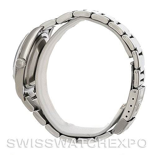 The image shows a Rolex Explorer 114270BKAO Men's Stainless Steel Black Dial 114270BKAO Men's Stainless Steel Black Dial watch from the side, highlighting its case, crown, and bracelet.