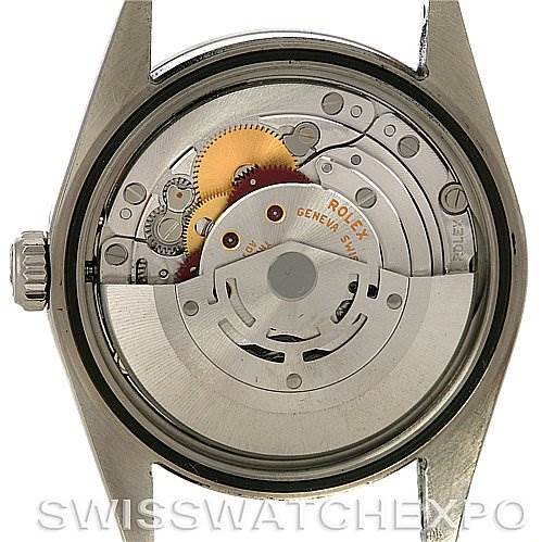 The image shows the movement and internal mechanism of the Rolex Explorer 114270BKAO Men's Stainless Steel Black Dial 114270BKAO Men's Stainless Steel Black Dial watch from a back view with the case back removed.