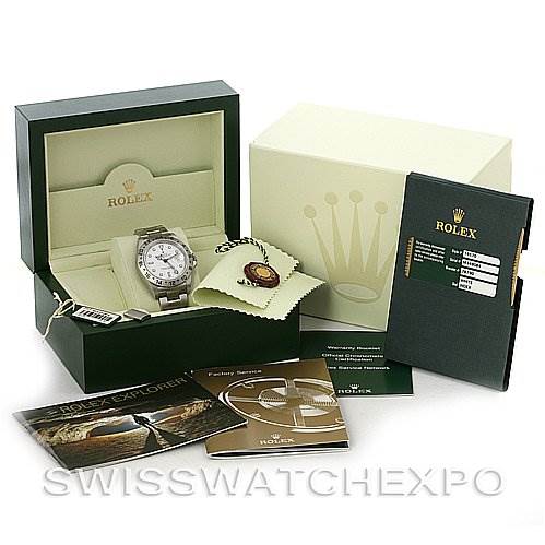 The image shows a Rolex Explorer 16570 Men's Stainless Steel White Dial 16570 Men's Stainless Steel White Dial watch, its box, manuals, tags, and authenticity card displayed from a slightly top angle.