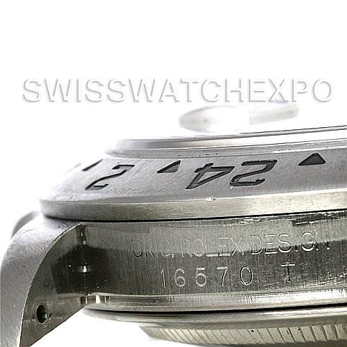 The image shows a side angle of a Rolex Explorer 16570 Men's Stainless Steel White Dial 16570 Men's Stainless Steel White Dial watch, specifically focusing on the case with its bezel and part of the lug visible.
