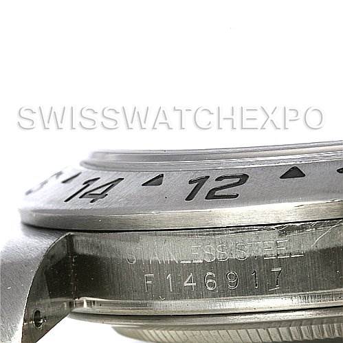 The image shows a close-up angle of the bezel and part of the case with serial number of a Rolex Explorer 16570 Men's Stainless Steel White Dial 16570 Men's Stainless Steel White Dial model watch.