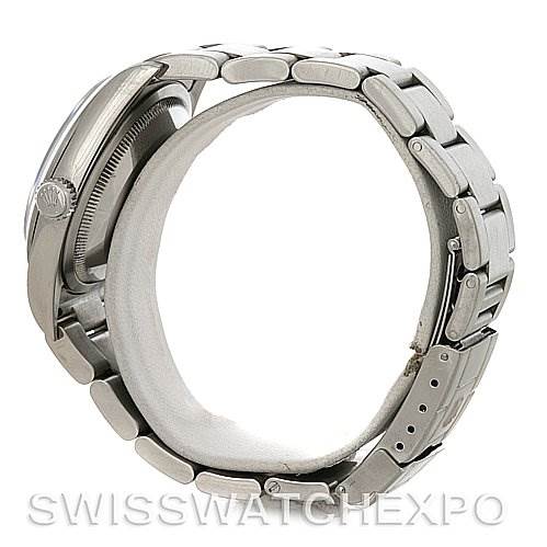 The image shows a side view of the Rolex Explorer 114270 Men's Stainless Steel Black Dial 114270 Men's Stainless Steel Black Dial watch, focusing on the bracelet and the crown.