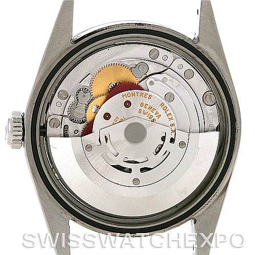 The image shows the back view of a Rolex Explorer 114270 Men's Stainless Steel Black Dial 114270 Men's Stainless Steel Black Dial watch, revealing its internal movement mechanism.