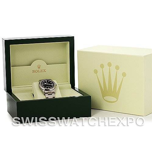 The image shows a Rolex Explorer 114270 Men's Stainless Steel Black Dial 114270 Men's Stainless Steel Black Dial watch in its open box with its branded outer box beside it.