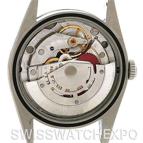 The image showcases the internal movement mechanism of the Rolex Explorer 14270 Men's Stainless Steel Black Dial 14270 Men's Stainless Steel Black Dial watch with its caseback removed.