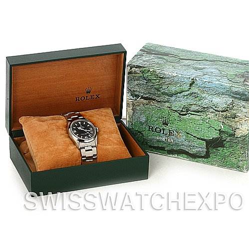 The image shows a Rolex Explorer 14270 Men's Stainless Steel Black Dial 14270 Men's Stainless Steel Black Dial watch placed inside its open box, accompanied by an exterior box beside it.