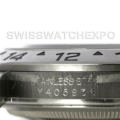 This image shows a close-up side view of the bezel and serial number engraving on a Rolex Explorer 16570 Men
s Stainless Steel White Dial 16570 Men
s Stainless Steel White Dial watch.