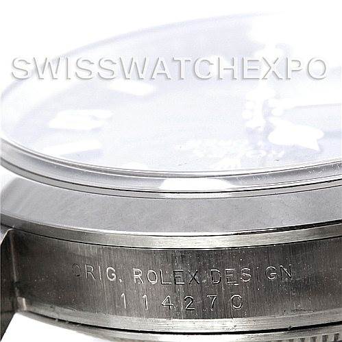 The angle shows a side view of the Rolex Explorer 114270 Men's Stainless Steel Black Dial 114270 Men's Stainless Steel Black Dial model, focusing on the engraved serial number and part of the crystal.