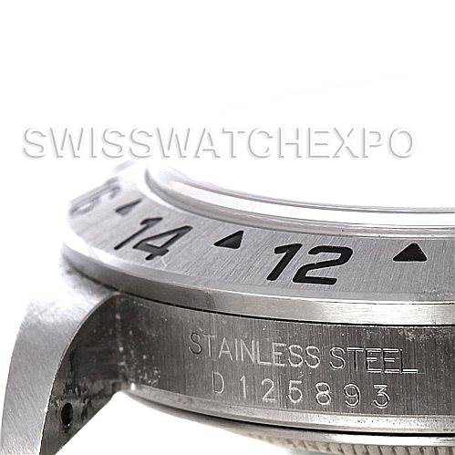 This image shows a close-up side view of the stainless steel bezel and case back of a Rolex Explorer 16570 Men's Stainless Steel White Dial 16570 Men's Stainless Steel White Dial watch.