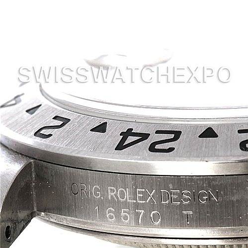 This image shows a side view of a Rolex Explorer 16570 Men's Stainless Steel White Dial 16570 Men's Stainless Steel White Dial watch, focusing on the bezel and the engraved model number 16570 T.