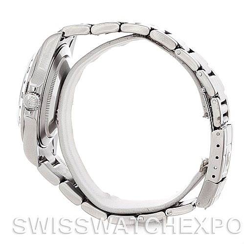 This side view photo of the Rolex Explorer 16570 Men's Stainless Steel White Dial 16570 Men's Stainless Steel White Dial watch showcases the case, crown, and bracelet.