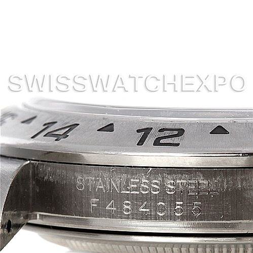 The image shows a close-up of the bezel and side profile of a stainless steel Rolex Explorer 16570 Men's Stainless Steel White Dial 16570 Men's Stainless Steel White Dial watch, highlighting the engraved numbers and serial number.