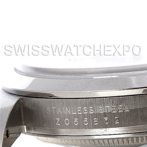 This image shows a close-up of the side of a Rolex Explorer 114270 Men's Stainless Steel Black Dial 114270 Men's Stainless Steel Black Dial watch, specifically highlighting the engraved serial number on the stainless steel case.