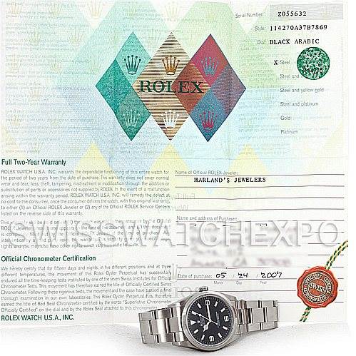 The image shows a Rolex Explorer 114270 Men's Stainless Steel Black Dial 114270 Men's Stainless Steel Black Dial model watch with its warranty card, official chronometer certification, and original documentation.