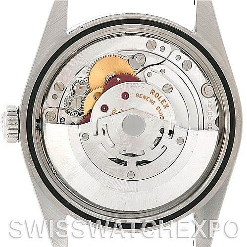 The image shows the back view of a Rolex Explorer 114270 Men's Stainless Steel Black Dial 114270 Men's Stainless Steel Black Dial model, highlighting the internal watch movement components.