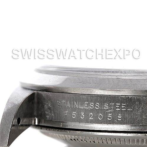 This image shows a close-up side view of the case side and bezel of a Rolex Explorer 114270 Men's Stainless Steel Black Dial 114270 Men's Stainless Steel Black Dial watch, highlighting its stainless steel material and serial number.