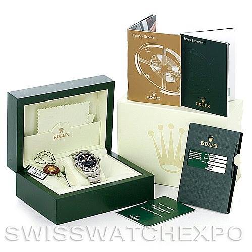 The image shows a Rolex Explorer 216570 Men's Stainless Steel Black Dial 216570 Men's Stainless Steel Black Dial watch with its box, manuals, tags, and warranty card.