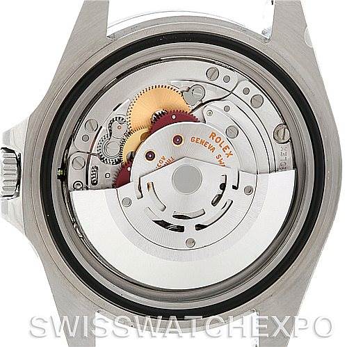 This image shows the movement mechanism of a Rolex Explorer 16570 Men's Stainless Steel White Dial 16570 Men's Stainless Steel White Dial watch from the back angle, revealing intricate gears and components.