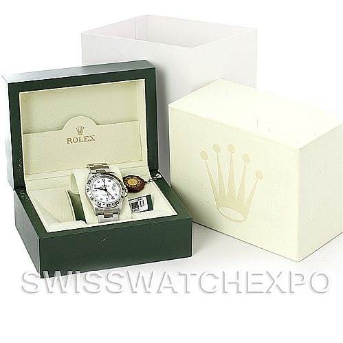 This image shows a Rolex Explorer 16570 Men's Stainless Steel White Dial 16570 Men's Stainless Steel White Dial watch and its accessories from a front angle, including the box, tags, and outer packaging.
