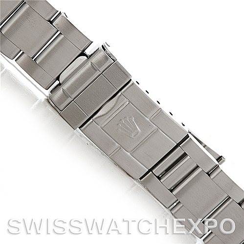 This image shows a close-up of the clasp and bracelet of a Rolex Explorer 16570 Men's Stainless Steel White Dial 16570 Men's Stainless Steel White Dial watch, emphasizing the brand's logo.