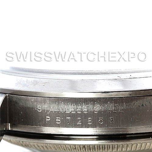 This image shows a close-up view of the case back and edge of a Rolex Explorer 114270 Men's Stainless Steel Black Dial 114270 Men's Stainless Steel Black Dial watch, highlighting the stainless steel engraving and serial number.