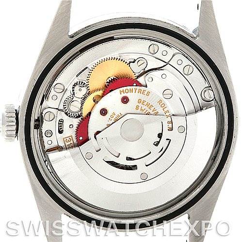 The image shows the internal mechanism and movement parts of a Rolex Explorer 114270 Men's Stainless Steel Black Dial 114270 Men's Stainless Steel Black Dial watch from a rear angle with the case back removed.