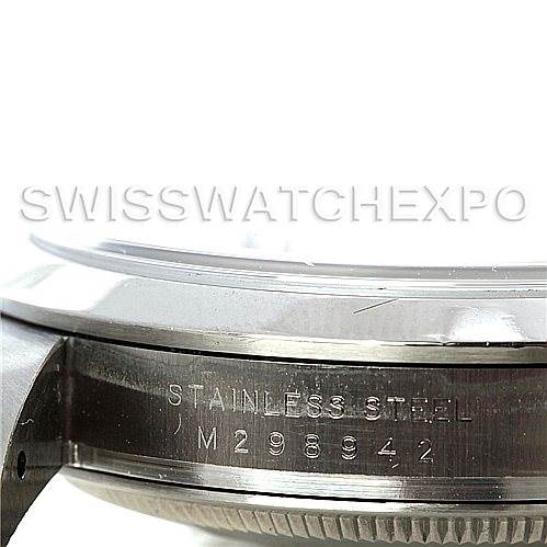 This image shows a close-up angle of the side casing of a Rolex Explorer 114270 Men's Stainless Steel Black Dial 114270 Men's Stainless Steel Black Dial watch, highlighting the stainless steel material and serial number.