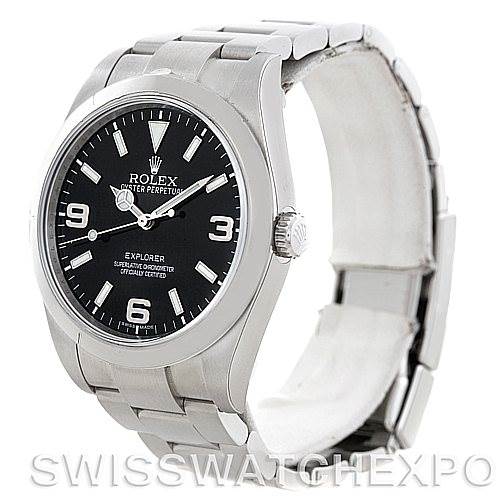 The image shows a side angle of a Rolex Explorer 214270 Men
s Stainless Steel Black Dial 214270 Men
s Stainless Steel Black Dial watch, displaying its face, bezel, crown, and part of the bracelet.