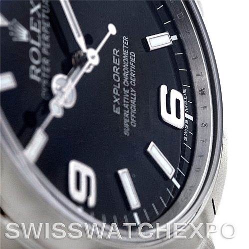 This is a close-up of a Rolex Explorer 214270 Men
s Stainless Steel Black Dial 214270 Men
s Stainless Steel Black Dial watch face, showing the dial, hands, markers, and part of the bezel.