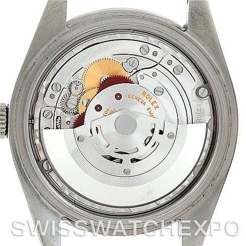 The image shows the back view of a Rolex Explorer 114270 Men's Stainless Steel Black Dial 114270 Men's Stainless Steel Black Dial watch, revealing its internal movement parts.