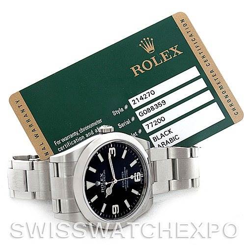 The image displays a Rolex Explorer 214270 Men's Stainless Steel Black Dial 214270 Men's Stainless Steel Black Dial watch at an angle showcasing the bracelet and green certification card laid out.