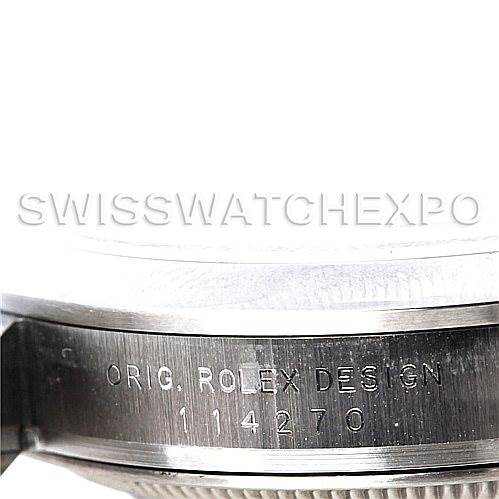 The image shows a close-up of the side of a Rolex Explorer 214270 Men's Stainless Steel Black Dial 214270 Men's Stainless Steel Black Dial watch, highlighting the engraved model number 114270.