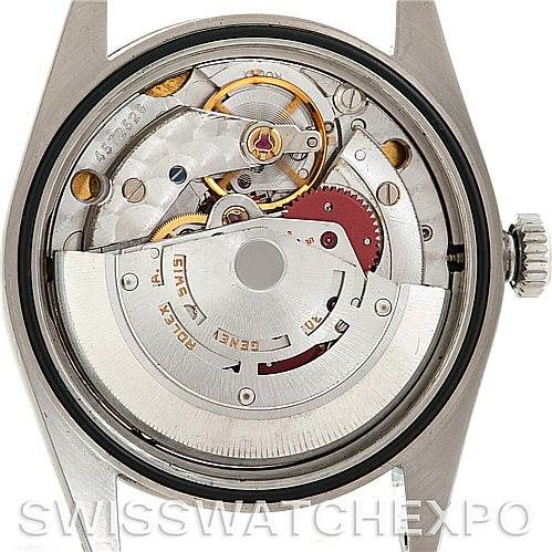 The image shows the movement and internal mechanics of a Rolex Explorer 14270 Men's Stainless Steel Black Dial 14270 Men's Stainless Steel Black Dial watch from a rear angle with its case back removed.