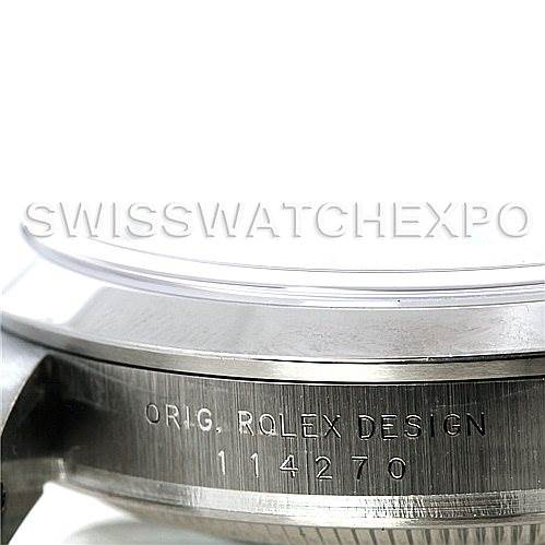 This image shows a close-up angle of the side of the Rolex Explorer 114270 Men's Stainless Steel Black Dial 114270 Men's Stainless Steel Black Dial watch, highlighting the engraved "Orig. Rolex Design 114270."