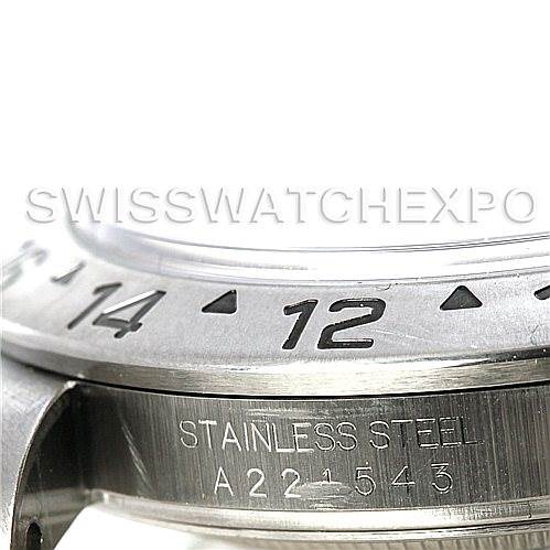 This image shows a close-up of the side of a Rolex Explorer 16570 Men's Stainless Steel White Dial 16570 Men's Stainless Steel White Dial watch, highlighting the bezel with numerals and part of the stainless steel case.