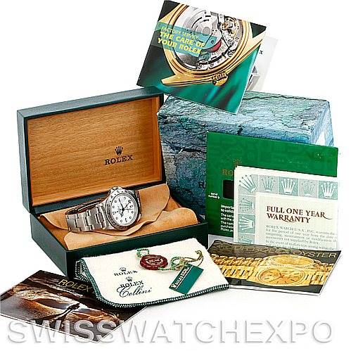 This image shows a Rolex Explorer 16570 Men's Stainless Steel White Dial 16570 Men's Stainless Steel White Dial watch and its accessories, including the box, warranty card, and care booklet.
