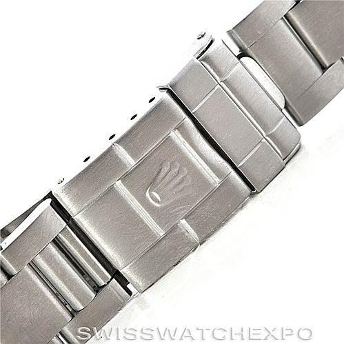 This image shows the clasp and part of the stainless steel bracelet of a Rolex Explorer 16570 Men's Stainless Steel White Dial 16570 Men's Stainless Steel White Dial watch.