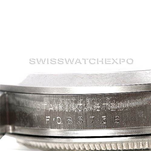 This image shows a close-up of the case and serial number engraving on a Rolex Explorer 114270 Men's Stainless Steel Black Dial 114270 Men's Stainless Steel Black Dial watch.