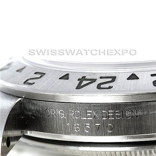 The image shows an angled close-up of the bezel and case side of a Rolex Explorer 16570 Men's Stainless Steel White Dial 16570 Men's Stainless Steel White Dial model, displaying "Orig Rolex Design 16570".