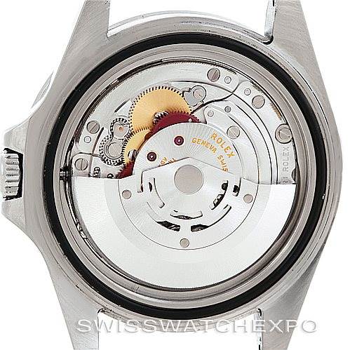 The image shows the back view of a Rolex Explorer 16570 Men's Stainless Steel White Dial 16570 Men's Stainless Steel White Dial model, highlighting its movement and internal mechanics.