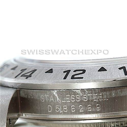 This image shows a close-up of the bezel and side case, including the serial number, of a Rolex Explorer 16570 Men's Stainless Steel Black Dial 16570 Men's Stainless Steel Black Dial watch.
