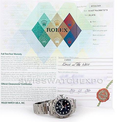 The image shows a Rolex Explorer 16570 Men's Stainless Steel Black Dial 16570 Men's Stainless Steel Black Dial watch along with its warranty certificate and chronometer certification documentation.